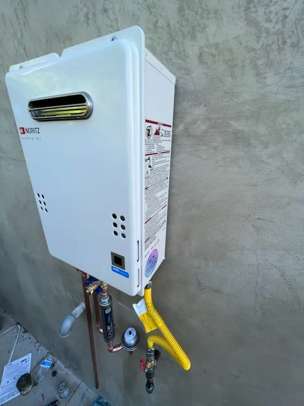 Tankless water heater installation for Brantwood Manor homes